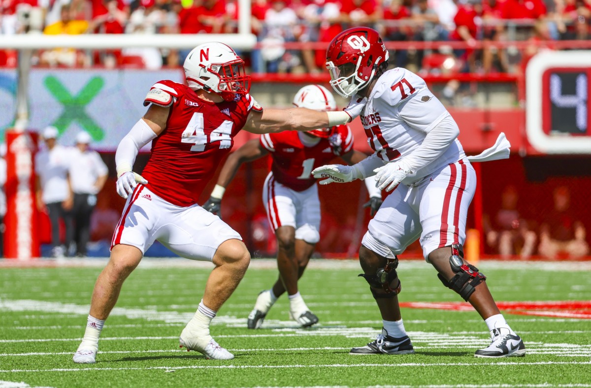 Sep 17, 2022; Lincoln, Nebraska, USA; Oklahoma Sooners offensive lineman Anton Harrison (71) blocks Nebraska Cornhuskers defensive end Garrett Nelson (44) during the game at Memorial Stadium. Mandatory Credit: Kevin Jairaj-USA TODAY Sports